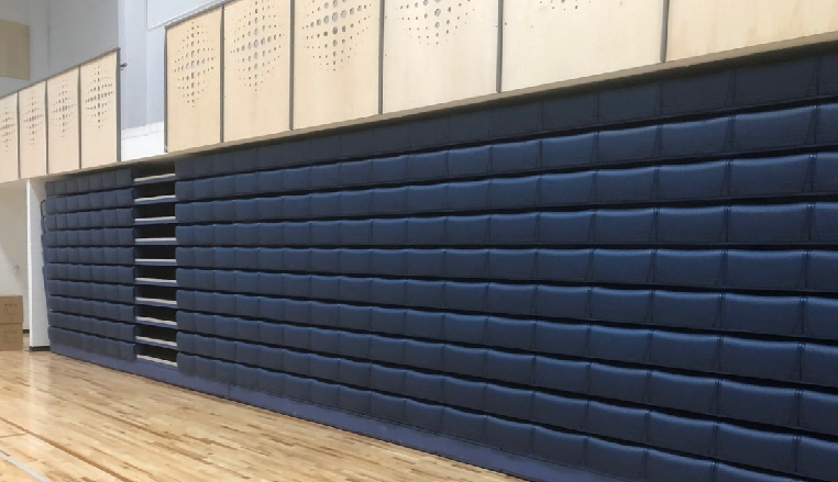 Retractable seating recessed under the balcony